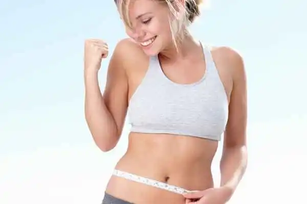 woman happy after fat reduction treatment Diss