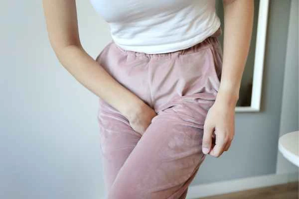 older woman running to the toilet because of urinary incontinence Diss